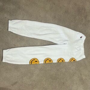 Aviator nation never worn sweatpants white with smiley faces. Size 12y